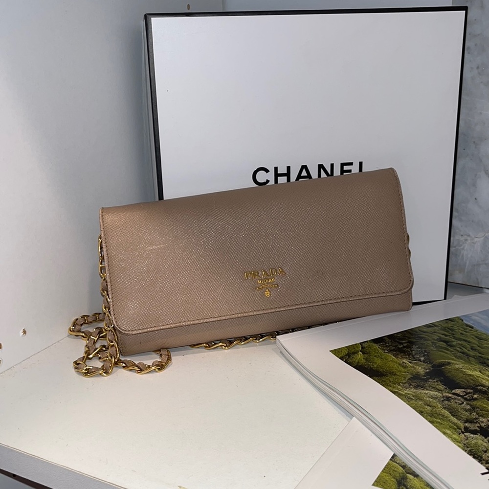 Prada wallet with chain . Good condition
